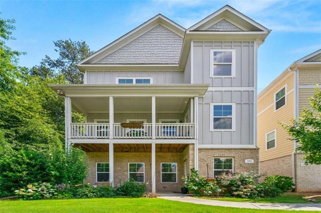 Elegant 4BR/3.5BA end-unit single family home in the desirable Marvelle community! This spacious home features an open-concept main level with a gourmet kitchen, oversized island, granite countertops, stainless steel appliances, and views to the living and dining rooms perfect for entertaining. Upstairs offers a loft area, laundry room, and three generously sized bedrooms, including a luxurious primary suite with a double vanity, tiled shower, and walk-in closet. The fully finished basement includes a private bedroom, full bath, office nook, and large living space-ideal for guests, in-laws, or a home office. Additional highlights include a 2-car garage, hardwood floors, and a private end-unit lot with peaceful treetop views. Enjoy low-maintenance living just minutes from Marietta Square, I-75, and Truist Park. Seller is eager-bring your best offer and close quickly!