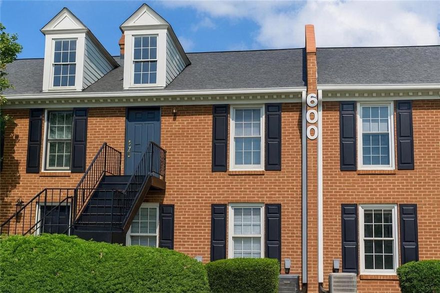 Just 2.4 miles from Marietta Square. Newly Renovated condo located in a gated community with dedicated parking space. Complete with new granite countertops, brand new luxury vinyl plank flooring throughout, New white shaker style cabinets, all NEW appliances, and fresh paint. Two bed, two bath split roommate plan boasts large bedrooms each with their own bathroom and walk-in closet. Enjoy the privacy of second floor living with no one above you. The cozy living area features a fireplace, and the separate dining room leads into a bright sun room, filled with natural light. The galley kitchen is designed for efficient use of space. All situated in a gated community with a pool. Enjoy the convenience of being just minutes away from parks, dining, and shopping, making this location ideal for a vibrant lifestyle. Don’t miss your chance to own this meticulously updated condo in a prime Marietta location. Schedule a showing today! Staging pics are AI enhanced