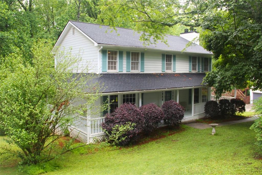 Location, location, location! Beautiful 4/2.5 home in Lassiter District. Great neighborhood, large lot.
This home has Southern charm with a full wrap-round porch and open deck. Every window has a great view.
Large open white kitchen with breakfast area looking out to lush greenery. Large living/dining/den offering flexible use and furniture arrangements.
New hail-proof roof with 50-year shingle, new flooring & paint throughout.
The oversized primary bedroom has 2 closets, and a fireplace. The primary bath has a separate shower and jet tub.
Three large secondary bedrooms and a 2nd bathroom are down the hall from the primary.
Drive-under/rear-entry garage/walkout basement.
Basement and garage are combined and there is storage, storage and more storage. Brand new state-of-the-art dry basement system. The drive-under rear entry garage is extra deep, ideal for adding workbenches or additional storage. Overhead storage for kayaks, ladders, etc. Lots of parking for family and friends. Large, wooded lot beyond the parking area with a small stream across the back of the property. No houses directly behind property. This part of the yard is flat from the parking area to beyond the creek, great for a firepit, gazebo, swings, or a trampoline. Room for it all. Very private lot and a nature lover's delight. You will see deer occasionally, mostly walking through the creek area.
This home has great features!