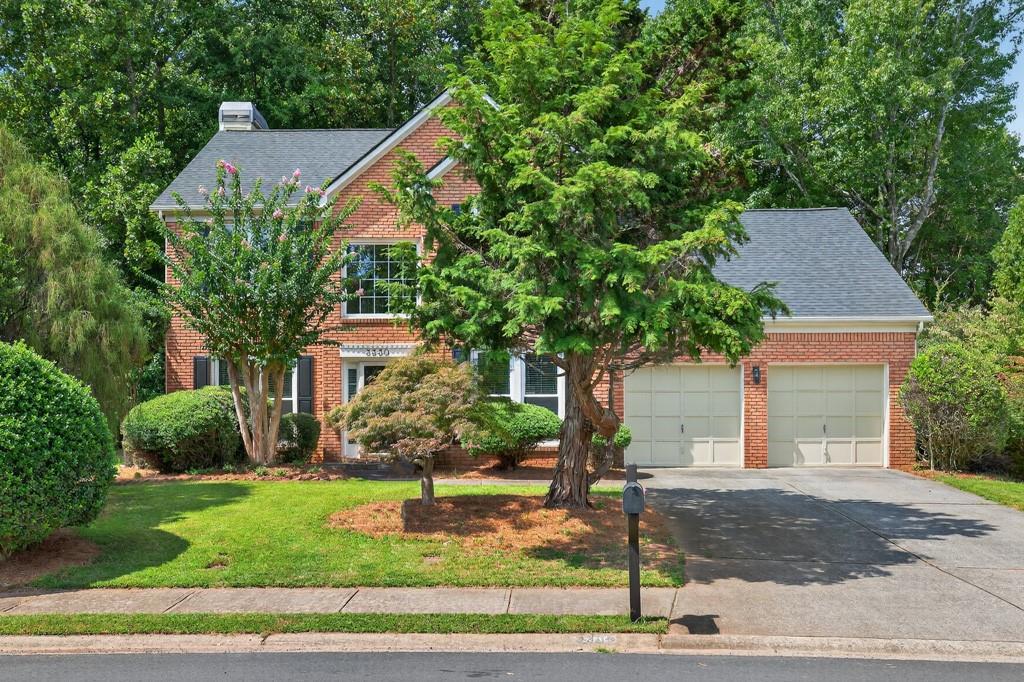 This well-maintained 4-bed, 2.5-bath home in sought-after Avocet offers an ideal blend of updates, space, and community amenities. From the entry, the formal dining room is on the right and living room on the left. The kitchen features granite counters, stainless appliances, and a large island open to the family room with a gas log fireplace. An XL tiled sunroom overlooks the wooded, private backyard—perfect for morning coffee or evenings with family. Upstairs, the primary suite includes a tray ceiling, double vanities, soaking tub, separate shower, and walk-in closet. Three additional bedrooms include a flexible bonus room for work, media, or play. Updates such as a new roof, modern light fixtures, and refreshed faucets and vanities add appeal. Avocet is a vibrant swim/tennis community with sidewalks, pool, tennis courts, and playground. Minutes to The Forum and Town Center for dining, shopping, and festivals—plus Starbucks and Dunkin around the corner. Don’t miss this opportunity in one of Peachtree Corners’ premier neighborhoods!