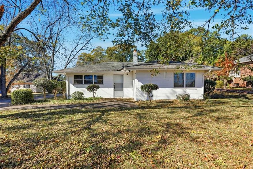 Don’t miss this vintage 1953 home with a great layout and tons of potential! This 3 bed, 2 bath home is situated on a large lot of towering pecan trees, flanked with picturesque camellia bushes. This property still features its original kitchen and baths—ready for restoration or a full modern update. Previously used as both a primary residence and a rental, it’s a versatile opportunity for renovation, resale, or possible office conversion (with zoning approval). A quick half-mile jaunt will bring you to the heart of McDonough’s bustling downtown. There’s almost endless parking potential, with a 2-car garage, 2-car car port, and wrap-around driveway.
Many big-ticket items have been taken care of so you don’t have to - updated vinyl windows, carpet, fresh paint exterior paint, 1 year-old water heater, 5 -year-old HVAC. Location (location, location!), lot size, and character make this a unique opportunity you’ll want to jump on!