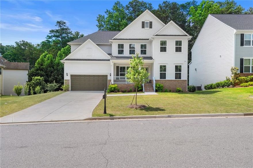 This 2024-built stunner is packed with space, style, and one of the best locations in the neighborhood—directly across from the pool, clubhouse, pickleball, basketball court, and playground. Yes, all the fun is literally steps from your front door!. Inside, you’ve got 5 bedrooms, 4.5 bathrooms, over 3,300 sq ft of living space, and an unfinished basement for all your storage needs. Right when you walk in, you're greeted by an inviting foyer, a big dining room to your right (think holidays or dinner parties), and a bright home office with French doors to your left—perfect if you work remoteThe main level has a full guest suite with its own bathroom—great for visiting family or live-in parents. There's also a tucked-away flex nook that can be a second workspace, coffee bar, or even a mini play zone. The kitchen is straight out of a magazine—white cabinets, quartz countertops, huge island, stainless steel appliances, walk-in pantry, and a stylish backsplash that ties it all together. Open-concept living room with big windows, waterproof flooring, and a cozy vibe that’s perfect for relaxing or entertaining. Step out onto your back deck—ideal for grilling or just kicking back with a drink on a warm evening. Upstairs, the primary suite is massive with a spa-like bath: double vanities, soaking tub, tiled shower, and a closet big enough for your full wardrobe (and then some). You’ve also got 3 more large bedrooms, a loft hangout space, and laundry upstairs for convenience.The unfinished basement gives you plenty of room for storage or a future gym/workshop setup.