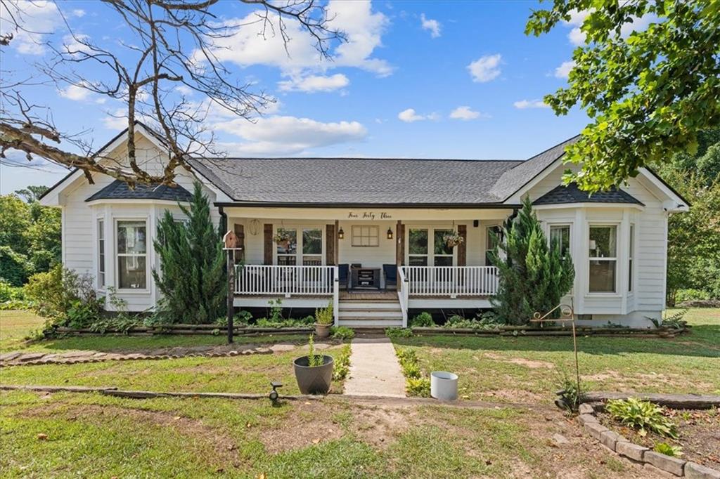 This lovely custom-built home on over half an acre of land in beautiful Buchanan is filled with all of the southern charm you’re after including large, covered front and back porches for relaxing in your rocking chair. A big living room with plenty of natural light and a cozy fireplace flows into the eat-in kitchen with pantry. The home’s primary bedroom is oversized and features and en suite bath with double vanity. Three additional bedrooms are all well-sized and share a hall bath. There’s a large separate laundry room, too. Don’t miss out on this one! It will go quickly.