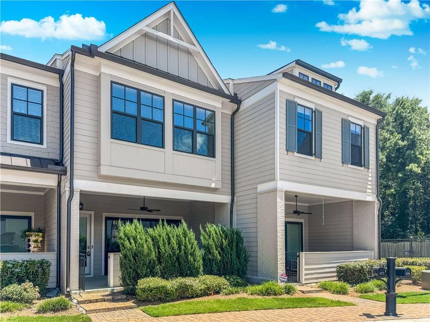 Available Now! Like-New Luxury Townhome in Sought After Village at Towne Lake! Beautiful finishes throughout. Inviting, open-concept floorplan. The large slider doors in the family room open to a great outdoor space with a covered porch for entertaining. Enjoy cooking and relaxing w/ an open chef-inspired kitchen & living area w/ 10+ ft ceilings. This home has modern touches like stone countertops w/ plenty of cabinets and walk-in pantry as well as upgraded lighting . Upstairs you will notice 10ft ceilings and an open rail staircase. The owner’s suite showcases a modern light double vanity w/ upgraded countertop, an oversized shower & expansive walk-in closet. Also upstairs, 2 guest BRs with walk-in closets, 2nd full bath with tiled walls and a laundry room. As a bonus the community is gated, beautifully maintained and offers a range of amenities such as: a pool, pickleball court, bocce ball, fire pit, a dog park and more. Resident Benefit Package included. Check out our 5-Star Reviews on Google. Rent quoted reflects discount for on time payment, ask for details.