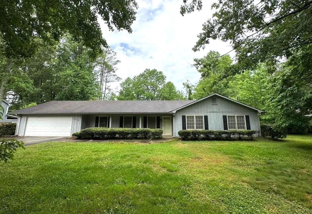 Welcome to your next home! This delightful ranch-style rental features 3 spacious bedrooms and 2 full baths. As you enter, you'll find an inviting layout that includes a formal living area, dining room and separate family room. The well-designed kitchen offers ample counter space and storage. Step outside to enjoy the covered rear porch, a fantastic spot for morning coffee or evening gatherings while overlooking the serene backyard. Additional features include a convenient 2-car garage. Nestled on a flat lot in a friendly neighborhood with highly rated schools and easy access to local amenities, this home is perfectly situated for a fulfilling and active lifestyle, ideal for those looking for convenience and community. Don’t miss out on this wonderful rental opportunity! Schedule your showing today and make this charming ranch your new home! .