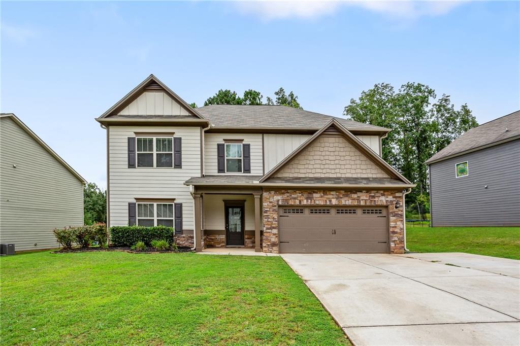 Welcome to 256 Berkleigh Trails Drive—this spacious 6-bed, 4-bath beauty offers room to grow in one of Hiram’s most sought-after neighborhoods. Inside, enjoy dual staircases, a dramatic two-story layout, gourmet kitchen with granite counters, stainless appliances, and a large island perfect for gathering. The oversized living room, formal spaces, and guest suite on the main floor make it ideal for entertaining. Upstairs, a serene primary suite and Jack-and-Jill bedrooms provide both privacy and flexibility. Just minutes from the Silver Comet Trail, shopping, and dining—this one has the space and the location. Ask about 100% financing with our preferred lender!