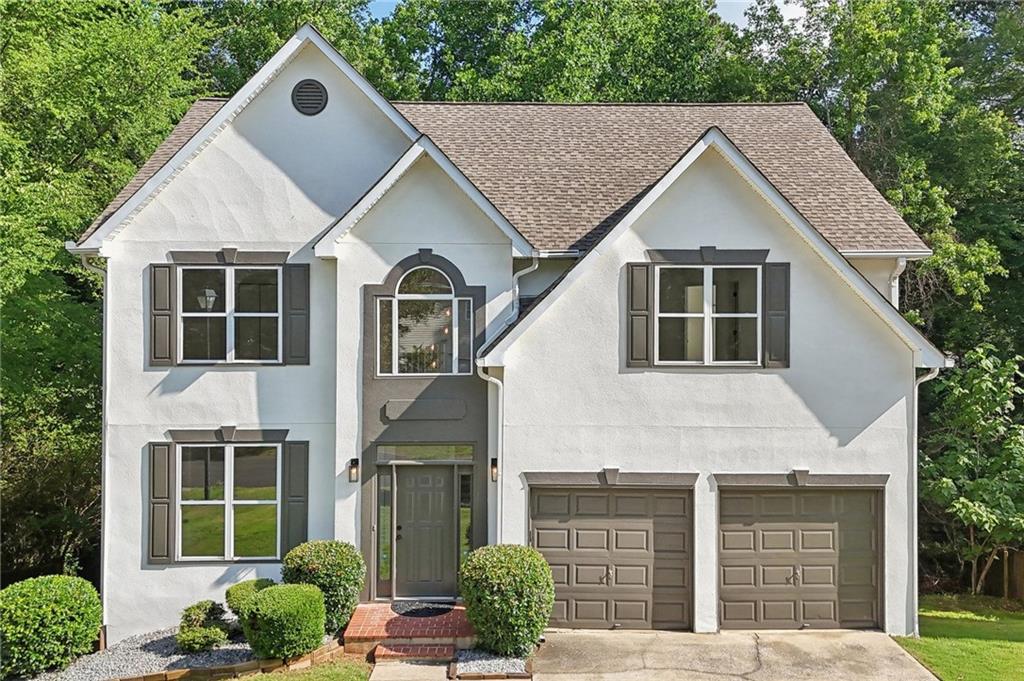 If you're looking for upscaled living, a home that's upsized for all of life's adventures, and upgrades galore, this is your golden ticket. Sitting up high on Blackjack Mountain in the coveted Eagle Ridge estate, this six-bedroom, 3.5-bathroom beauty is more than just a house, it’s a labyrinth of lifestyle possibilities, where every turn leads to comfort, elegance, and surprises you never knew you needed.
Skip the fixer-upper, this home is turn-key perfection.
Are you the type who spends weekends rolling up your sleeves and getting mired in maintenance tasks? If so, look away! This isn't the home for you. The heavy lifting has already been done, and every surface has been thoughtfully refreshed. Instead, picture rolling into Marietta Square for brunch, a leisurely afternoon browsing boutique shops, or an evening of live music. No toolkits required, just a relaxed weekend exactly the way you want it.
This stunning home has been given the full VIP treatment, so you don’t need to lift a finger. The kitchen glow-up features custom cabinetry, Carrera quartz countertops, and sleek matte black finishes. The bathroom spruce-up includes polished porcelain tiles, stylish black fixtures, and modern lighting. The flooring level-up introduces brand-new engineered hardwoods, fresh carpet, and sophisticated tile throughout. The basement power-up offers two bonus rooms, a bathroom, a kitchenette, and fresh tile flooring, making it ideal for guests, an in-law suite, hobbies, or even an epic home theater. The bright home step-up brings recessed lighting, smooth ceilings, and a spacious attached kitchen level two car garage.
A home filled with memories, now ready for new ones.
For decades, this house has been more than just bricks and beams, it has been a home in the truest sense. Birthday candles have been blown out in the kitchen, bedtime stories whispered in upstairs bedrooms, and countless front-door farewells waved as loved ones ventured out into the world. Now, with the kids grown and thriving out of state, the original owners are ready to pass the torch to someone new. Your chance to fill these rooms with fresh laughter, new traditions, and unforgettable moments has arrived.
Where upscale meets upcountry charm.
With 0.29 acres of peaceful, wooded paradise, mornings here are spent sipping coffee with the birds as the tranquil creek flows below, and evenings are for stargazing without city distractions. But don’t worry, you’re still within arm’s reach of everything. Major highways are just five minutes away, Marietta Square with its shopping, dining, and historic charm is only fifteen minutes down the road, and Downtown Woodstock is twenty minutes away for a lively atmosphere. When you crave big city energy, Downtown Atlanta is just twenty-five minutes away.
Trade up!
Eagle Ridge homes rarely grace the market, and this one is move-in ready with no corners cut. Whether you’re growing your family, setting up a multigenerational oasis, or simply claiming your rightful place at the top, this home is your chance to elevate your lifestyle. Organize your private inspection today.