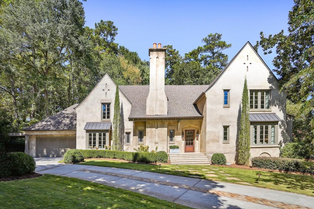 Stunning home on a sought-after street in Tuxedo Park and just around the corner from Chastain Park. The home boasts beautiful features, an open floor plan, formal living room, wood-paneled office and kitchen overlooking the sunlit dining area. Completing the main level is the owners suite with his and her closets and large bathroom plus a secondary bedroom with en suite. The terrace level of the home is a great entertaining space complete with gym, full bathroom and play area. The backyard of the home is walkout level from the kitchen, low maintenance and overlooks the pool and pool cabana. Two bedrooms are upstairs and share a Jack and Jill bath. There is a large unfinished space upstairs that you can add at least one more bedroom/bathroom if needed.