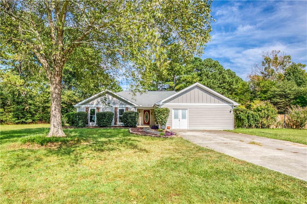 Welcome to this beautiful 3-bedroom, 2-bathroom ranch-style home located in the highly desirable Loganville school district. Perfectly designed for comfortable living, this home offers a spacious layout with features the whole family will love. Step inside to find a large kitchen with an abundance of cabinet space-ideal for all your storage and culinary needs. The sunroom provides the perfect spot for morning coffee or a peaceful retreat with views of the private backyard. The generously sized owner's suite boasts a relaxing soaking tub, a separate shower, and plenty of room to unwind after a long day. Enjoy outdoor living in the fully fenced backyard, complete with a privacy fence and a storage shed-perfect for tools, toys, or extra gear. Don't miss the opportunity to own this move-in ready gem in a fantastic location! Schedule your showing today!