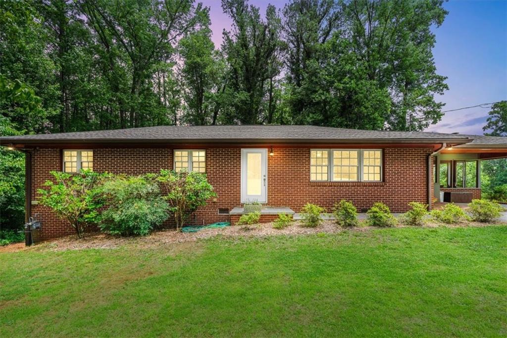 Fully renovated in 2017, this move-in ready 3BR/2BA ranch combines 1950s charm with modern updates. Open-concept layout includes a gourmet kitchen with white cabinets, granite countertops, and views to the family and dining rooms. Two covered porches plus a large back deck provide great outdoor living spaces. Spacious laundry room offers extra storage. Exterior-entry basement includes a workshop area and ample storage. Situated on a quiet, private lot over half an acre at the end of the street. Convenient to Marietta Square, parks, and shopping. Full of character and ready for its next chapter—don’t miss this gem!