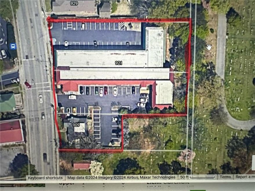 909, 917, and 921 Church Street, Decatur, GA Two hotels (Super 8 Hotel and Decatur Inn) and a single-family residence. Assemblage of all three parcels, providing a significant plot size in downtown Decatur. The current zoning supports a variety of future development opportunities, with potential for a zoning change to accommodate larger-scale projects. Backs onto the Historic Decatur Cemetery, adding a serene backdrop. One block from the newly renovated Glendale Pool and Tennis facility. Three blocks from the popular dining and retail scene, including Leon’s Full Service. 0.25 miles to Decatur High School, within proximity to luxury townhomes and residential developments. Walking distance to MARTA stations, city parks, and Decatur Square, providing unparalleled connectivity. Development Potential: The land assemblage offers numerous possibilities for redevelopment, catering to the increasing demand for mixed-use and residential projects in Decatur’s booming real estate market. The location supports a vibrant mixed-use development combining residential condos, commercial retail, and office spaces. Ideal for maximizing returns by integrating commercial components on the ground level and residential units above. Condominium Project High-end residential condos would be in high demand in this market, offering luxury living with easy access to Decatur’s shops, restaurants, and public transportation. Potential to create spacious units with premium amenities and scenic views of the nearby historic cemetery and city. An opportunity to build a high-end retirement community with commercial services tailored to the needs of an aging population. The walkable and transit-friendly location is ideal for retirees seeking an active lifestyle near downtown Decatur’s healthcare and leisure amenities. The land assemblage at 909, 917, and 921 Church Street presents a once-in-a-lifetime opportunity to develop a landmark project in the heart of Decatur. Whether you're considering a luxury townhome community, mixed-use residential/retail project, or a specialized development like a retirement home, this prime site offers the foundation for extraordinary returns and community impact. This is only being sold as the land assemblage not being sold separately.