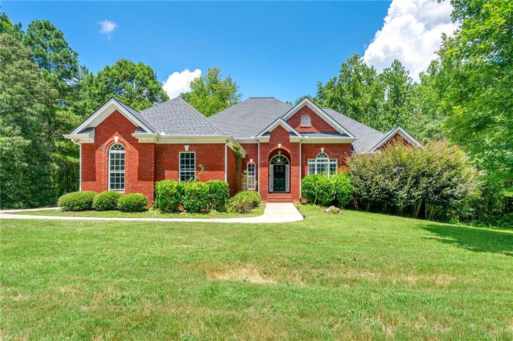 Tucked away on a peaceful wooded lot in Oxford’s quiet Northwood community, this Craftsman-style home blends timeless charm with thoughtful design. From the inviting front porch to the open, light-filled interior, you’ll find elegant touches throughout—hardwood floors, multiple living and dining spaces, and a warm, welcoming kitchen with ample counter space, custom cabinetry, and a cozy keeping room featuring a fireplace. The spacious primary suite offers a peaceful retreat with a sitting area, private deck access, and a spa-like bath designed for relaxation.
Outside, the property offers a private, tree-lined backyard perfect for quiet mornings or outdoor entertaining. While the basement remains unfinished, it provides excellent potential for future customization—whether as a workshop, additional living space, or storage. With access to community amenities, plus updates like a newer roof and septic system, this home delivers comfort, privacy, and room to grow—all in a beautifully maintained neighborhood setting.