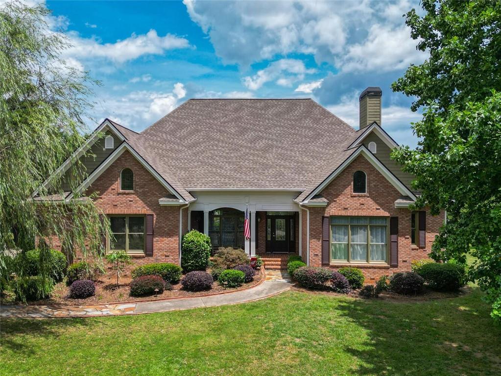 Bask in mountain views and backyard bliss from this timeless all-brick Craftsman, perfectly perched in one of the area’s most coveted communities. From the sparkling pool to the stylishly updated interiors, every detail is designed for effortless living and everyday luxury. The freshly renovated kitchen shines with quartz countertops, stainless appliances, and finishes that strike the perfect balance between beauty and function. The floor plan? Incredibly versatile—two bedrooms on the main (including a serene primary suite), two more upstairs, plus a spacious bonus room for play, work, or winding down. Thoughtfully connected living and dining spaces flow outdoors to a covered porch and fenced yard made for memory-making. With top-rated schools, modern updates, and undeniable curb appeal, this move-in-ready retreat is the total package.