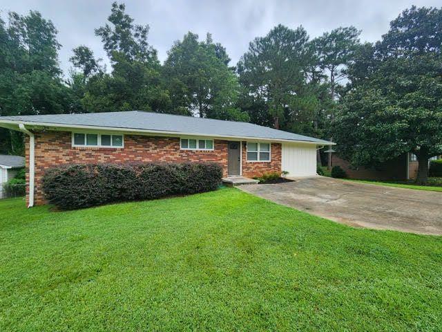 Beautifully renovated 4 Bedroom/2 Bathroom brick ranch in Smyrna's coveted Forest Hills neighborhood available for immediate move in! The kitchen features quartz countertops, shaker cabinets, and brand new stainless steel appliances. The primary suite offers a large walk-in closet, brand new carpet, and new walk-in frameless glass shower and double vanity. Living area is open concept, including a dining area off the kitchen. Outside you'll find a large deck and flat ,fully fenced yard, which backs up to Tolleson Park, which offers swim/tennis/pickleball/playground/walking path/baseball/soccer fields. The home is in the perfect location: walking distance to Smyrna Market Village shops/restaurants/parks/playgrounds/splash pad/library/community center, and just a few miles from The Battery/Truist Park Braves stadium. Rent includes the following: all kitchen appliances including refrigerator, washer & dryer. Pets allowed with a $500 pet fee. Owners are open to a multi-year lease. Will include biweekly landscaping if lease starts in August!