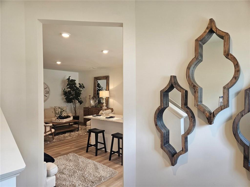 WHY RENT -- YOU CAN OWN YOUR NEW HOME FOR $2000/MONTH -- YOU will LOVE this New Maintenance Free/Swim Community Located In Conyers- Conveniently Located To I-20, Easy Access To Downtown and Hartsfield Airport. Our Beautiful Rear Entry Ivey Model Offers 3BD/2.5 BA w/Huge Two Car Garage, Gourmet Eat-In Kitchen White Cabinets, Walk-In Pantry, Granite Countertops, Island w/Brkfst Bar, Separate Dining Area Upstairs Boast An Open Loft/Game RM Great For Relaxing and Entertaining, Two Oversized Bed RMS, Laundry, Inviting Spa Owners Suite W/Tray Ceiling, Sitting Area, Huge WIC Closet, Raised Vanity W/Dual Sinks, Granite Countertops, Relaxing Garden Tub W/ Separate Shower. HURRY IN FOR LIMITED TIME 30 YR FIXED RATE 4.99% (5.91% APR) + $10,000 ANYWAY YOU WANT IT - See Agent For Details and Availability. Directions Google Maps - TYPE in Riverside by Rocklyn Homes.