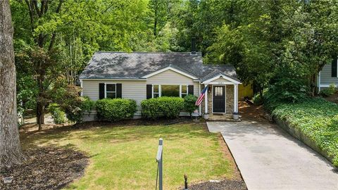 Photo of 1881 Woodland Hills Avenue NW, Atlanta, GA 30318 (MLS # 7758030)