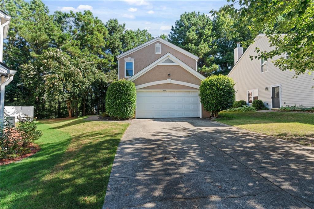 Welcome to a rare find in the highly sought-after
Hutchinson Pointe Subdivision! Nestled at the end of
a peaceful cul-de-sac, this charming 3 bed, 2.5 bath
home is loaded with updates and personality. Enjoy
brand-new flooring throughout, sleek new kitchen
countertops, and a brand-new furnace to keep
things cozy. The kitchen is a cook’s dream with a
gas stove and oven, while the living room offers a
warm gas-log fireplace for those crisp Georgia
evenings.
Step out back to your own private oasis—complete
with a fire pit and tranquil wooded views. It’s the
perfect spot for morning coffee or evening s’mores
under the stars.
Located in the quietest pocket of the neighborhood,
this home offers both serenity and convenience. Just
minutes from Hwy 400, top-rated schools, and
premier shopping including The Collection at
Forsyth. Neighborhood amenities include swim,
tennis, and a clubhouse—everything you need for
easy living in the heart of Cumming.