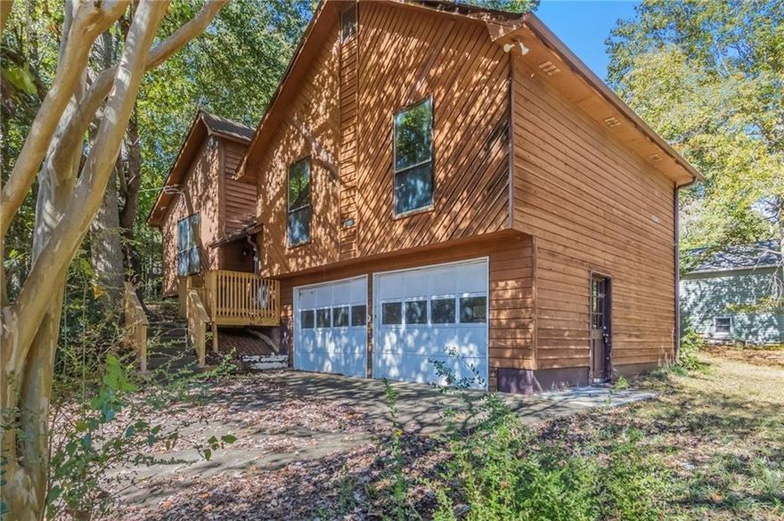 Discover the potential in this 3-bedroom, 2-bath ranch-style home situated on a spacious corner lot in the quiet Indian Springs community of Canton. This property offers a fantastic opportunity for investors or buyers seeking a full renovation project. The home features an unfinished basement, a two-car garage, and a large sloped yard with a distinctive exterior design.

While the home needs extensive updates throughout—including kitchen, baths, and portions of the deck—it offers solid fundamentals and plenty of space to reimagine and restore. Due to its current condition, this home may appeal primarily to cash or renovation-loan buyers. Conveniently located near shopping, dining, and major highways, this property is ideal for those looking to bring new life to a home with great potential and character.