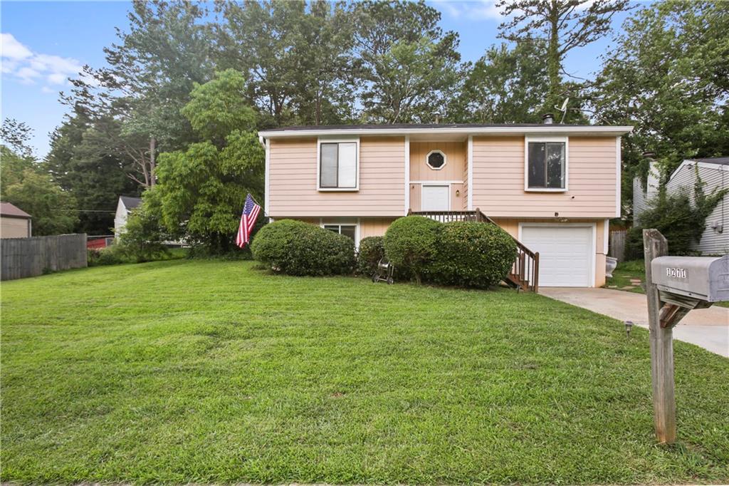 Welcome to this split level home in Stone Mountain. With recently replaced flooring (2023) this home offers carpet free living. The split level layout boasts 4 bedrooms and 2 full bathrooms. Upstairs, you'll find 2 generously sized bedrooms and one full bathroom, a spacious eat in kitchen with access to the deck. The living room offers space for gathering and a charming stone, fireplace. The lower level offers two private bedrooms and an additional bathroom. Located on a quiet street in Muirfield with a reasonably sized yard, this home presents opportunities for just about anyone; from first time home buyers to multigenerational families and investors seeking a solid rental opportunity. With close proximity to grocery stores, shopping Stone Mountain Park and I-285--access is not a problem. Schedule a showing today!
Public records reflect 1562 square feet and does not reflect the square footage of the fourth bedroom.