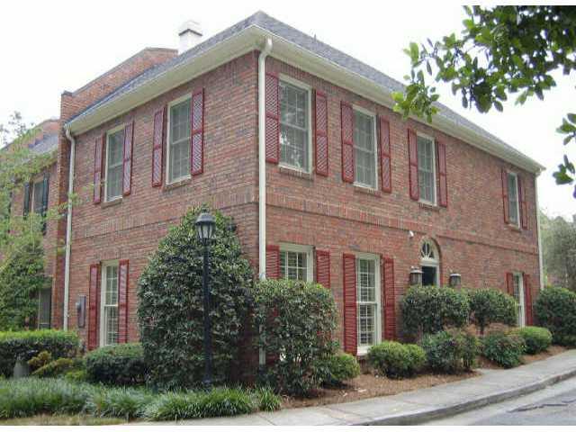 Elegant End Unit with 3 walls of windows! One of lrgest flrplans in comm. Sophisticated upgrades include kitchen w/stained cabinets, granite, tile backsplash, & island w/add'l storage. Master bath w/granite vanity, travertine floors, and double head shower w/tile surround. Hrdwds on entire 1st Flr!