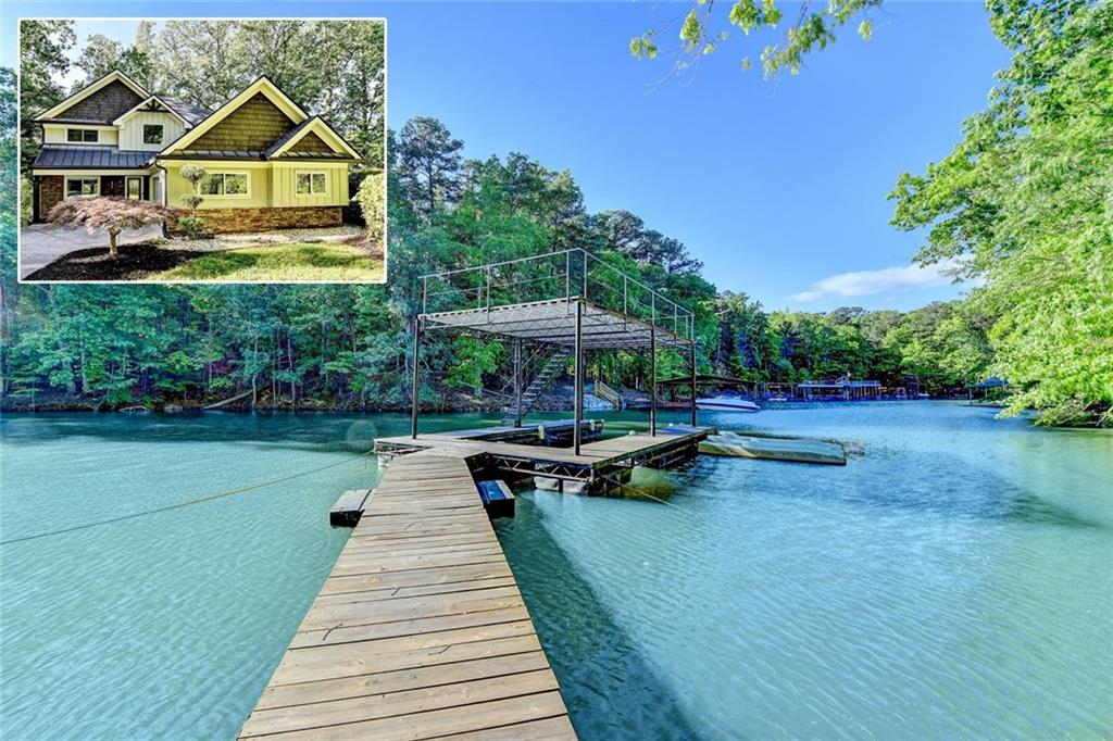 Lake Lanier Party Dock and 4 bed/ 4 bath Home WITH Full In-Law Suite. Looking for a change of pace? Live life with tons of fun during warm, sun-filled days. Whatever your water sport of choice; whether it's fishing, waterskiing, snorkeling, swimming, or boating, it's all here. NO HOA-Bring your toys!! Relax to nature's spectacular, sunset cruises and stay to watch the dreamy twinkling stars come out. Constellations are easy and fun to find. You've just found the perfect lake front/view cove. This home is perfect for entertaining, relaxation, watersports, or just as a second home to getaway. The main home has a stepless entry that opens to the large living room and separate sunroom. Picture your own style against this freshly painted neutral pallet. Open Floor plan on main level includes: hardwoods, moulding, stacked-stone fireside sunken Den, Dining Room and a Kitchen with a broad statement sized stone island with breakfast bar. Fabulous stove top that would delight a chef. Walk-in pantry. Grab a favorite book and relax in the Indoor-outdoor living space as you step out onto the screened in porch boasting a vaulted ceiling with fan. There are stairs from the porch that lead right to the lake's cove and dock. Owners' suite has a view of the cove from the windows on the back of the home along with walk-in closet, large enough for king-sized furniture, and private bathroom. 3 upstairs bedrooms, split bedroom plan, with 2 full bathrooms. Immaculate and move-in ready. In-Law Suite has a 1 bed/1bath, kitchen and its own living room. Private entrance or use the interior steps with wrought iron rails, and hardwoods. Fantastic space for the very sought after multigenerational life style. It can be used as a teen suite, extra living space, guest apartment, or roommate plan. Bells and Whistles include: Judges panel, vaulted ceilings, 2 rear decks, Tray ceilings, Coffered ceilings, antique styled ceilings, wood inlay in den, chef's kitchen, built in closet/organizer, Beadboard, warming fireplace style at oversized tub in in-law suite, french doors and so much more!! Lots of parking between the 2 car side entry garage and extended parking in driveway. Minutes to marketplace Boulevard where there is a Costco, BJ's, Walmart, Outback Steakhouse, Longhorn, Provino's, Chipolte, petco, Ulta, Lowes, Ross, TJ Maxx, HomeGoods to name a few. Hwy 400 is just a few minutes away. About 50 or so miles to Hartsfield Jackson, International Airport. Leave the hectic, hustle, bustle, and chaos behind. Go on and step down the Park-like walk from the home to a 1 slip dock and 2 personal watercraft floating docks. Float on over quickly to Bald Ridge Marina and gas up, largest portion of the lake is South at Buford Dam, just minutes away. Margaritaville with its fireworks on major holidays and varies through the year. Port Royal, Pelican Petes, Pig Tails and Fish Tails are great to dock your boat and get a beverage and a bite to eat. Lake living is its own laid-back lifestyle. Come enjoy it!