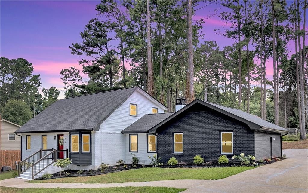Where Lifestyle Meets Location. Discover this beautifully renovated 4-bedroom, 2-bath home blending modern design and smart functionality—everything you’re looking for in Cobb County.
Inside, you'll find a spacious open-concept layout that seamlessly connects the kitchen and family room, which features a cozy fireplace, perfect for relaxing nights or entertaining guests. The kitchen has been fully updated with quartz countertops, stainless steel appliances, stained cabinetry, and sleek new fixtures. A separate dining room and an additional flex space provide versatility for a formal living room, home office, or playroom.
The primary suite is thoughtfully located on the main level, separate from the secondary bedrooms for added privacy. It features generous closet space and a stylishly updated bathroom. A convenient mudroom off the garage offers the perfect drop zone for daily living, ideal for busy families or pet lovers.
Throughout the home, enjoy brand-new LVP flooring, fresh interior and exterior paint, new quartz countertops, new appliances, and updated lighting and plumbing fixtures. Additional upgrades include a NEW ROOF, NEW WINDOWS, NEW HVAC, NEW WATER HEATER and a new garage motor, ensuring peace of mind and true move-in readiness.
This beautifully updated home sits on a quiet street just minutes from I-285, parks, shopping, and top-rated Cobb County schools. Don’t miss your chance, schedule your private tour today!