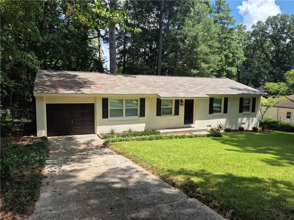 excellently Renovated 4 SIDED BRICK RANCH! Everything NEW! dream kitchen with humongous granite Island! New real Hardwood floors, new bathrooms, new Deck overlooking large fenced backyard. all New light fixtures.