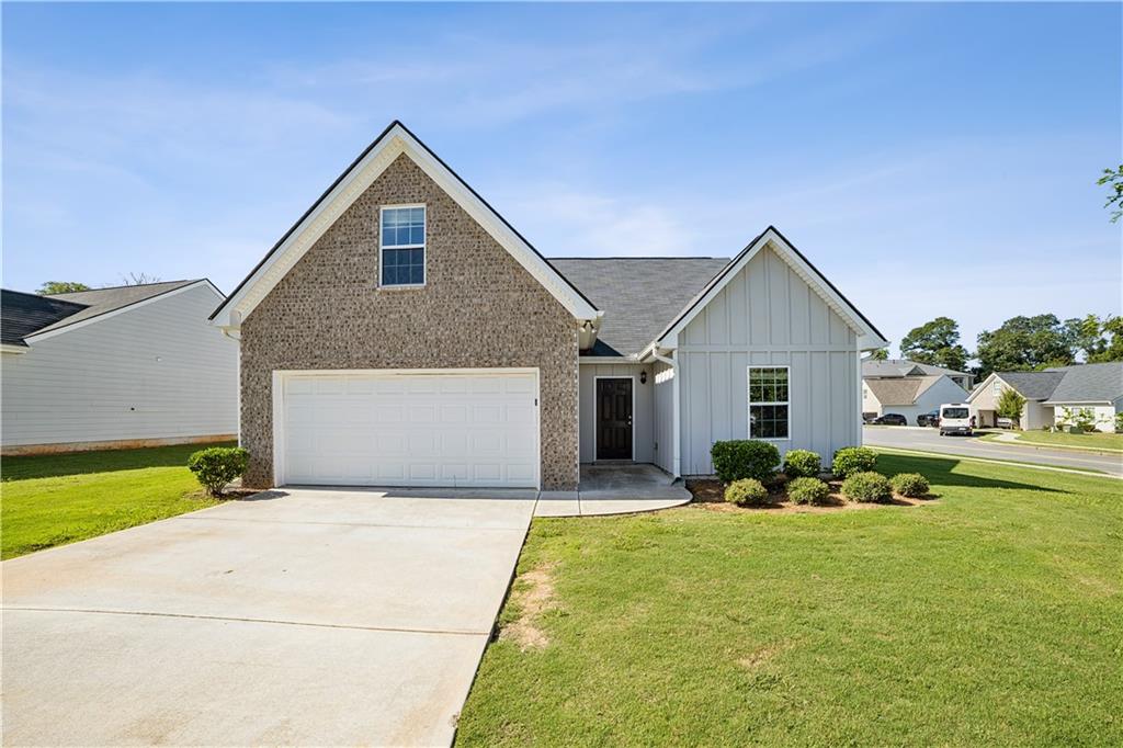 Welcome to this beautifully maintained ranch-style home offering the perfect blend of comfort and functionality. Situated on a flat, level lot, this inviting residence features 3 spacious bedrooms and 2 full bathrooms on the main level, providing convenient single-story living. And upstairs, you'll find an additional private bedroom and full bathroom—ideal for guests, a home office, or a quiet retreat. The heart of the home is the stylish kitchen, complete with white cabinetry, granite countertops, and a full suite of stainless steel appliances, including an electric range, microwave, refrigerator, and dishwasher. A pantry closet adds extra storage and convenience. Enjoy easy-care laminate flooring throughout the main living areas, while plush carpet in the bedrooms adds warmth and comfort. The open-concept layout creates a welcoming space for relaxing or entertaining. Additional highlights include a 2-car garage, providing plenty of room for parking and storage, and a low-maintenance yard on a level lot. Don't miss the opportunity to make this versatile and move-in-ready home your own!