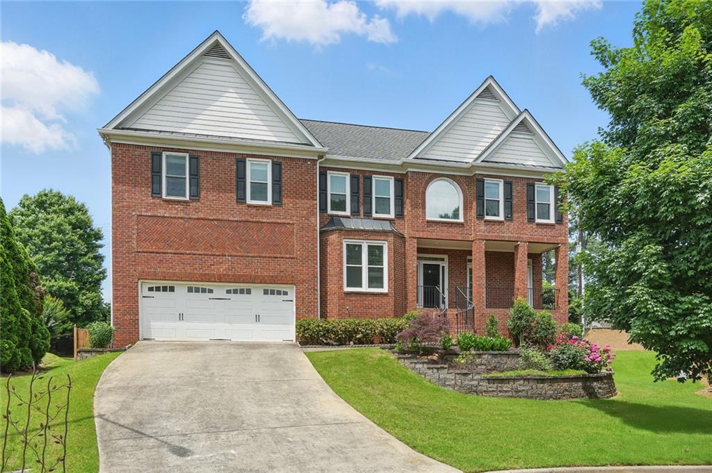 Stunning 5-bedroom/ 5.5-bathroom home in top ranked STEM school district! Murdock, Hightower, POPE High School. Prime CULDESAC location with Level & FENCED BACKYARD. Open Floorplan featuring white oak HARDWOOD FLOORS thru-out the Main Floor. Hard to find GUEST SUITE on MAIN LEVEL with Full Bath. UPDATED KITCHEN with center island, soft close cabinetry, GRANITE COUNTERS, 6 BURNER THERMADOR GAS RANGE and Sun-filled eating area. The Two Story Family Room features a Fireplace with Gas Logs and views the kitchen and Living Room. There is a Beautiful Banquet Sized Dining Room with Bayed Window off of the Front Foyer. The second Level features 3 bedrooms, each with their own private bathroom, a laundry room, & oversized Primary Suite with a large sitting room, full 5-piece ensuite & 2 walk-in closets with custom shelving systems. Fully FINISHED daylight BASEMENT with RecRoom, Bedroom, Full Bath, Bonus Room, & workshop. Enjoy the front porch or the huge fully FENCED BACKYARD with SCREENED PORCH and large deck. This turnkey home offers Low E Argon gas filled double and triple pane Windows. The Roof was replaced in 2014 & HVAC was recently replaced in 2024. Sought after Kings Farm Nbrhood with Clubhouse, Playground, Swim & Tennis.