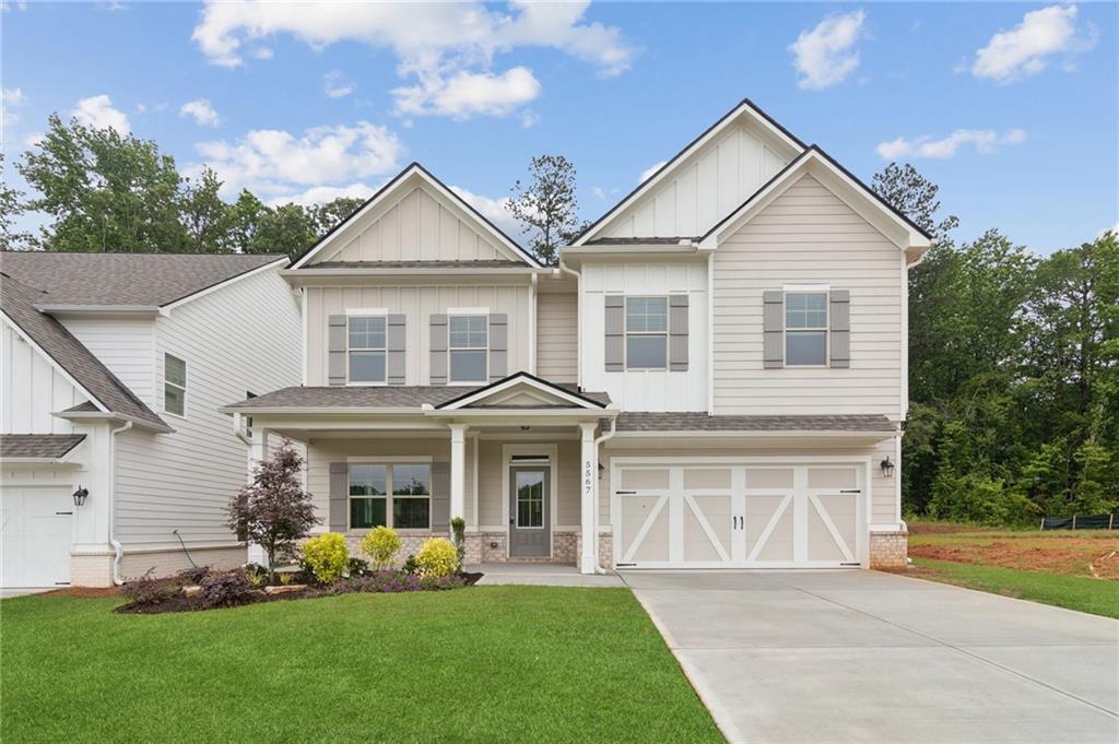 Built by EMC Homes GA, "Move-in Ready June 2025" ***$15,000 in FLEX CASH with Preferred Lender and Qualifying Purchaser. ***The Madison Plan 4 beds/3 baths. Covered Front Porch and Covered back Patio, Foyer entrance, Kitchen & Dining Room Open to Family room, Granite kitchen- island, Painted cabinets, Stainless Steel appliances/tile back-splash. Full bedroom and Bathroom on the Main Level. Two piece crown molding on main level family room & Owners suite, Hard surface flooring on entire main level. Huge Media Room on Second Level. Owners Suite w/trey ceiling, separate tub and shower, double vanities. Tile flooring in all of the bathrooms. Ask Agent for details. Mulberry Summit is an new home development in Flowery Branch. Mulberry Summit is minutes drive from I-985, Mall of GA, Cherokee Bluffs Park, Van Pugh North Park, lake Lanier Island, Downtown flowery Branch farmers market and some of the best shopping centers and entertainments.*****