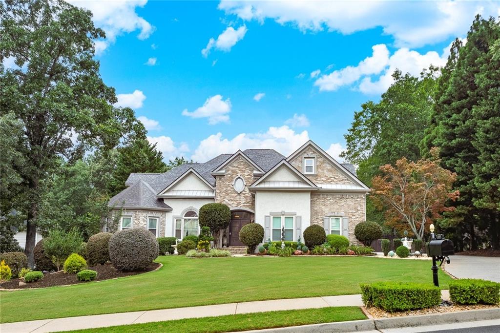 Executive Living in the Heart of Lost Mountain – Backyard Oasis + Full Finished Basement!
Welcome to luxury living reimagined in one of West Cobb's most prestigious neighborhoods – Lost Mountain. This stunning 6-bedroom, 5.5-bath executive home offers elegance, space, and functionality with thoughtfully upgraded modern features and a private backyard retreat that feels like your own slice of paradise.
Step inside through a brand-new custom front door and be greeted by natural light pouring through new energy-efficient windows and a spacious, open floor plan ideal for entertaining or multi-generational living. The heart of the home is the updated gourmet kitchen, boasting WiFi-enabled smart appliances including a microwave, stove, and refrigerator – perfect for the tech-savvy chef.
Relax or host with ease in the expansive living areas, including a fully finished basement featuring a private kitchenette, full baths, living space, and bedroom – ideal for in-laws or guests.
Retreat to your private backyard oasis, where you'll find mature fruit trees – peach, plum, fig, and apple – nestled among peaceful landscaping, offering both beauty and delicious bounty. Whether it’s morning coffee under the trees or weekend BBQs, this outdoor space is truly special.
Key Features:
• 6 generously-sized bedrooms | 5.5 bathrooms
• Full finished basement with private entry, kitchenette & 2 full baths
• Updated kitchen with WiFi/smart microwave, stove, and refrigerator
• New roof, new windows, and new custom front door
• 2-car garage with EV charger
• Fruit-filled backyard: peach, plum, fig, and apple trees
• Exclusive Lost Mountain community – tranquil, safe, and highly desirable
• Elderly parents – no problem – home has top of the line chair lift to terrace level.
Enjoy living in a neighborhood known for its top-rated schools, friendly community, and proximity to shopping, dining, and parks.
Don’t miss your chance to own this one-of-a-kind executive residence that blends luxury with lifestyle. Schedule your private tour today!
Professional Pictures coming soon!