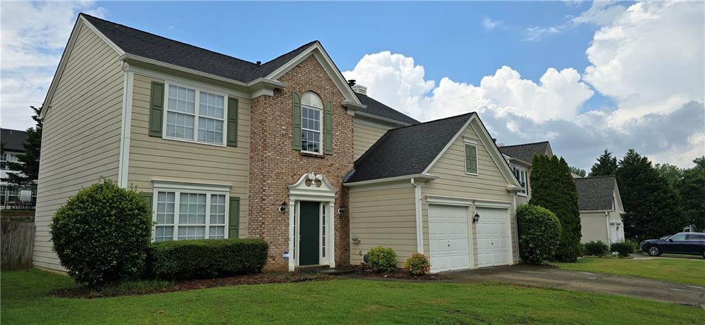Great home and fantastic Woodstock location! Nestled in a highly sought after neighborhood and school district. The home features a large eat-in kitchen with center island and a view to the bright, open family room. Separate dining room. Large master suite and bathroom, 3 secondary bedrooms and laundry room all on the upper level. Spacious, level backyard perfect for play and outdoor living. Just minutes to downtown Woodstock, and just a short drive to Roswell or I-575.