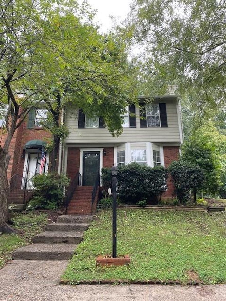 Remodeled and move in ready, spacious 2BR, 2.5BA, corner unit, town home in Wheeler school district.  Convenient to shopping, highways, entertainment, schools.  On the main floor, you'll love your separate living room with decorative fireplace, dining room with view to the private deck in back and the well equipped kitchen, offering stainless steel appliances, granite counters and plenty of storage in your white cabinets. The separate laundry room plus your half bath, complete this level.  On the second level, you'll find two large bedrooms each with its own full bath. Relax on your private deck with view of the woods and your private driveway.  A real find.  Shown by appointment only.
