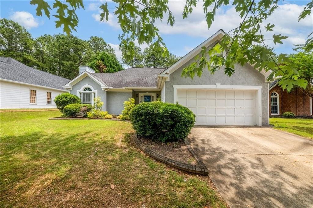 One level living within walking distance to Centennial HS, River Eves elementary school, East Roswell Park tennis courts, Centennial Kroger, shopping and dining. Open floorplan. Great room features cathedral ceilings overlooking designated dining area. Kitchen is updated with stone countertops and opens to the patio. Large Master bedroom with trey ceilings, renovated bath and walk-in closet. Fresh paint, hardwood floors and newer carpet. In close proximity to Chattahoochee River Trails, Big Creek Park Trails, minutes to exit 7 of GA 400 and historic Roswell shopping and dining.