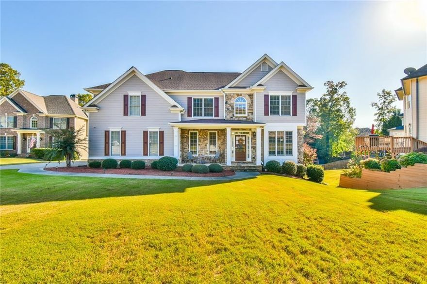 Motivated sellers! Nestled in a peaceful cul-de-sac, this spacious 5-bedroom, 5-bathroom home boasts incredible curb appeal and a welcoming atmosphere. Step inside to a beautifully detailed interior, featuring coffered ceilings in the formal dining and main living areas. The family room is bathed in natural light, complete with a cozy fireplace and built-in bookshelves. A main-level bedroom and bathroom provide added convenience, while upstairs you’ll find an expansive primary ensuite, freshly updated with marble floors, a frameless glass shower, and a soaking tub. Three additional bedrooms and a versatile loft complete the upper level. The finished basement extends your living options, with a full bathroom, kitchenette, and a ready made office or flex space. Outdoors, enjoy the private, fenced backyard and deck—ideal for relaxing or entertaining.  Located near 316 & 85 as well as shopping, schools and restaurants. This community is equipped with a pool, tennis courts, pond & playground. This gem is as beautiful as it is functional, inside and out.