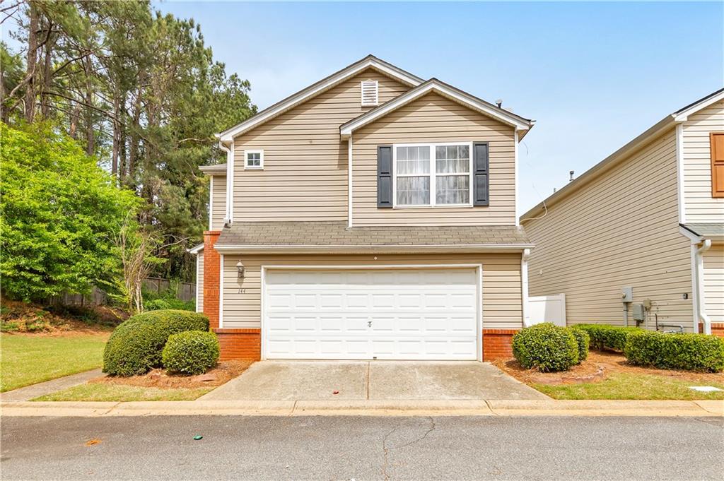 WELCOME HOME TO THIS CHARMING 2 BEDROOM 2.5 BATH HOME IN WINDCROFT SUBDIVISION IN BEAUTIFUL ACWORTH!
