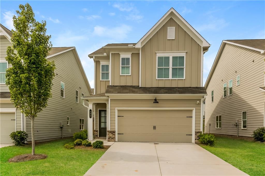 This home is professionally managed by Tricon Residential, dedicated to creating exceptional rental experiences. Featuring four bedrooms, two and one half bathrooms, and approximately 2,053 square feet, this well-maintained home offers a high standard of rental living, supported by a team that puts residents first. Tricon East Ridge is a charming single-family rental community less than seven miles from Downtown Woodstock. Enjoy virtually maintenance-free living with the conveniences of smart home technology including automatic thermostat control and keyless front door entry. Every home includes gourmet kitchens, attached two-car garages and private patios. Fully-fenced yards available on select homes.