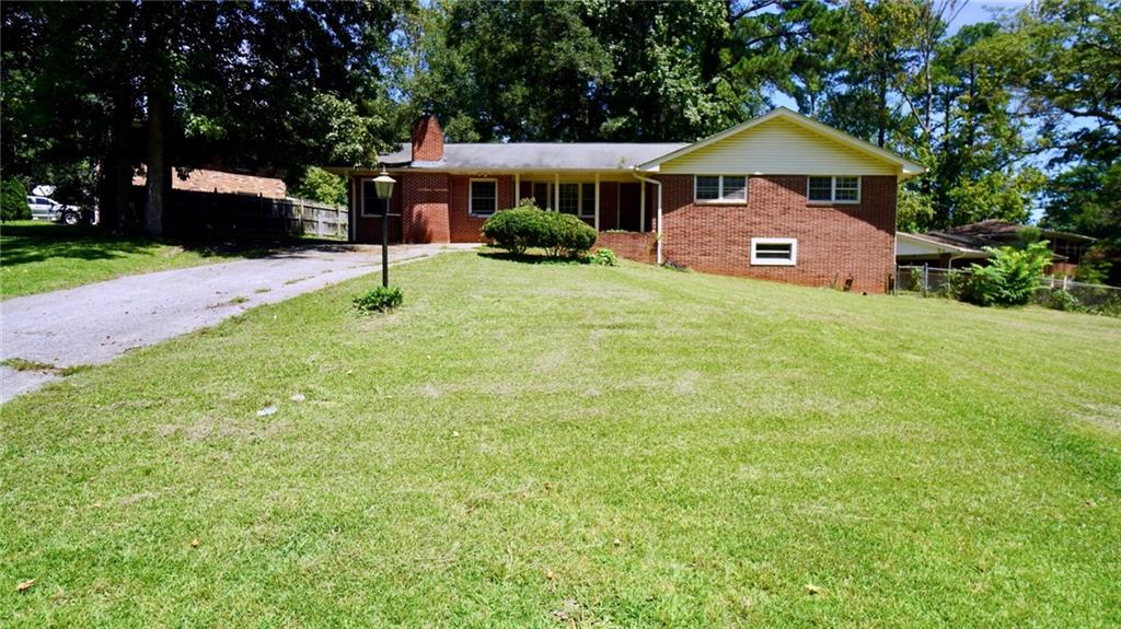 Welcome to this beautifully updated all-brick ranch in the heart of Morrow! This 4-bedroom, 2.5-bath home offers nearly 2,800 square feet of living space and has undergone several improvements to enhance its comfort and appeal. The main level features hardwood floors, an inviting living room with a cozy fireplace, and a spacious kitchen with granite countertops, stainless steel appliances, and a breakfast area. The primary suite includes a walk-in closet and private bath, while the finished daylight basement with interior and exterior access provides versatile space for a family room, office, or guest suite. Outside, enjoy a fenced backyard, covered porch, and ample parking with no HOA restrictions. Conveniently located just 20 minutes from Hartsfield-Jackson Airport and minutes from I-75, shopping, parks, and Clayton State University, this property is perfect for a homeowner or as a great investment opportunity with strong rental potential.