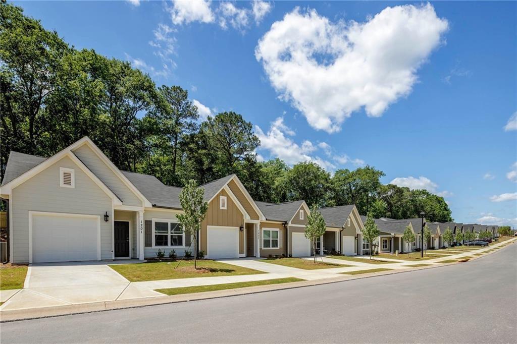 13 month lease price. Offering half a month's rent FREE! Call for updated pricing, specials and availability. Multiple floor plans available. Days on Market accrued is not specific to this current plan listed. Mention The Apartment Brothers as lead source. Brand New 2 & 3 Bedroom Homes for Rent
Covey Homes Loganville is a brand new community featuring charming single-level, ranch-style homes in Loganville, GA. Spacious layouts and amenities welcome you home, along with exceptional service and an ideal location close to retail, restaurants, recreation and entertainment. Residents can enjoy wide doorways, chef-inspired kitchens, attached one-car garages and much more. With rich landscaping and an expansive community clubhouse, fitness center and pool, our community also offers resort-style living with all of the features of Loganville close by. It's all right here at Covey Homes Loganville.
Covey Homes Loganville is developed by Jim Chapman Communities, Atlanta’s premier builder of one-level living communities.
