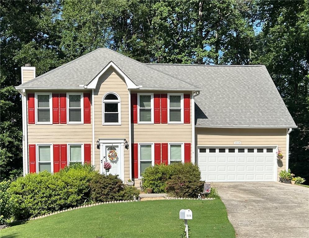 Well-appointed two-story traditional home on a full basement! Located on a cul-de-sac lot with a private backyard, this home offers beautiful spaces inside and out. A grand entryway welcomes you into the home. The kitchen features granite countertops, plenty of cabinet space, and stainless steel and black appliances. The kitchen has a view to the family room, which features a fireplace for ambiance year-round and warmth in cooler weather. There is a separate dining room. Half-bath on the main level. Another spacious room can be used as an office, reading room, play room, or piano room. The master bedroom is oversized, and the master bath is luxurious featuring a double vanity, separate shower and tub, and walk-in closet. Three additional bedrooms upstairs and another full bath. The basement is full and unfinished, providing many opportunities for storage and future expansion. A large deck provides a great place to enjoy the outdoors. A back patio is another nice place to enjoy nature. The yard is beautifully landscaped with colorful plants and flowers. Near schools, shopping, restaurants. Conveniently located near I-85 and GA-316. No HOA.