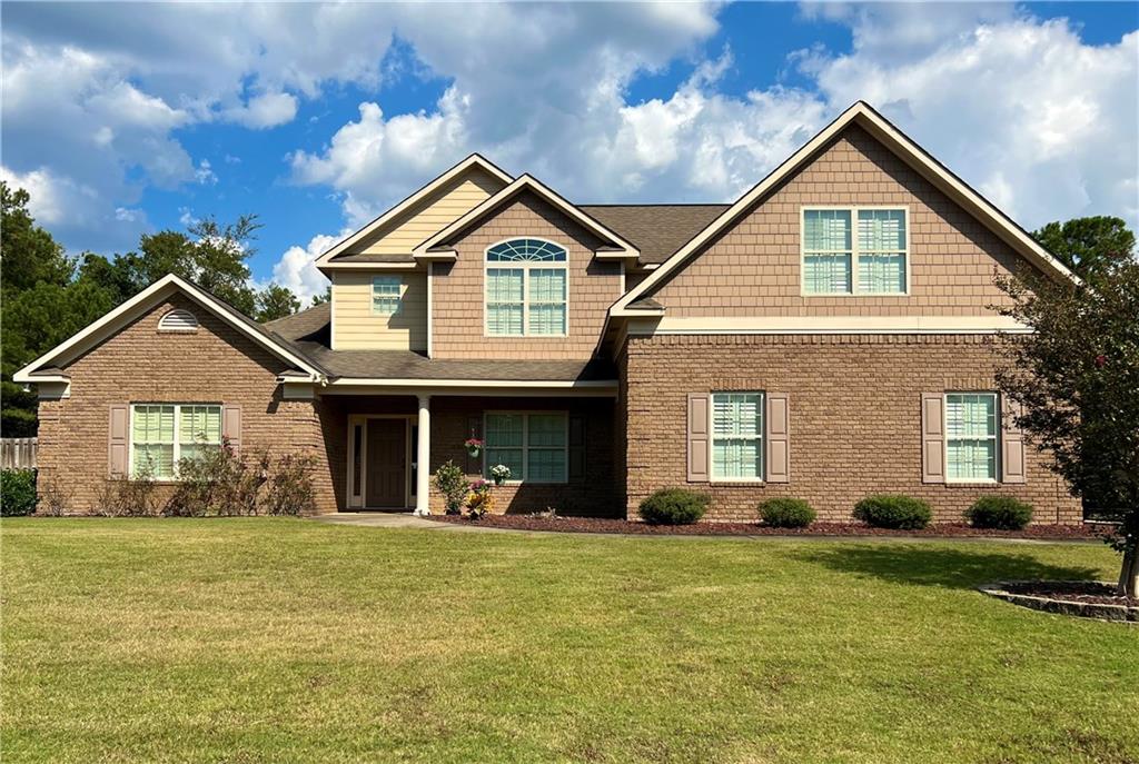 Welcome to 7170 Bridgemill Dr – a beautifully maintained and spacious home located in one of Columbus's most desirable neighborhoods! This 5-bedroom, 4.5-bath home features an open and inviting floor plan with high ceilings, abundant natural light, and tasteful finishes throughout. The kitchen is a chef’s dream with granite countertops, stainless steel appliances, a breakfast bar, and a cozy eat-in area that flows seamlessly into the living room with a fireplace centerpiece.
The oversized primary suite offers a true retreat with a luxurious en-suite bath featuring dual vanities, a soaking tub, separate shower, and generous walk-in closet. Additional bedrooms provide ample space for family, guests, or a home office. Step outside to a beautifully landscaped backyard perfect for entertaining, play, or quiet relaxation.
Located in a well-maintained, sidewalk-lined community with easy access to top-rated schools, shopping, dining, and I-185. This is the one you’ve been waiting for – comfort, style, and location all in one!