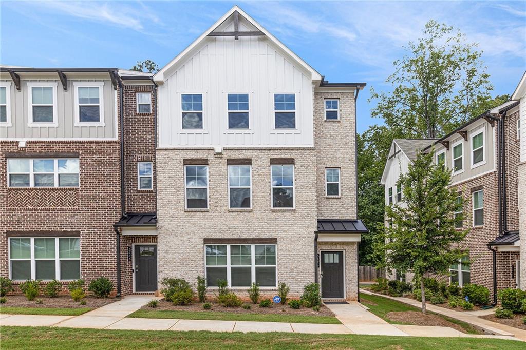 Stunning 3-Level End Unit in Avondale Park! Welcome to this beautifully designed townhome featuring custom upgrades and abundant natural light. The open main level boasts 9-ft ceilings, hardwood floors, and a chef’s kitchen with a massive Valor White quartz island, herringbone tile backsplash, 42" white cabinets, and a spacious pantry. The dining area overlooks a lush courtyard, while the great room with a fireplace is ideal for cozy evenings or entertaining. Step out onto the private deck with tree-lined views—perfect for morning coffee or evening wine.
Upstairs, enjoy dual sunlit primary suites:
Primary #1 features a spa-like bath with white quartz double vanities, oversized tile shower, private water closet, and walk-in closet.
Primary #2 includes a full en-suite bath and its own walk-in closet.
The terrace level offers flexibility for a guest suite, home office, or teen/in-law retreat with its own full bath and private entry. Additional perks include a 2-car garage, EV charging outlet, and extra storage.
Located near historic Avondale Estates and just 2 miles from vibrant Downtown Decatur shopping and dining!