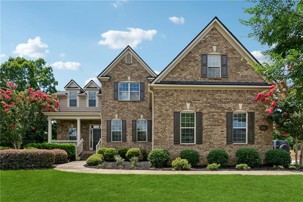 Welcome to this beautifully updated home located in the highly desirable HEARTHSTONE swim/tennis community, just minutes from downtown Alpharetta, Crabapple, and Avalon—all within the top-rated Milton High School district!
This spacious residence offers five generously sized bedrooms, each with its own ensuite bathroom and walk-in closet, including a main-level guest suite with a private deck—perfect for multi-generational living or hosting guests.
Step inside and enjoy the warmth of gleaming hardwood floors throughout, complemented by fresh interior and exterior paint for a bright, move-in-ready feel. A brand-new roof (2025) provides long-term peace of mind.
The chef’s kitchen is a true centerpiece, featuring custom cabinetry, granite countertops, a stylish tile backsplash, stainless steel appliances, and a walk-in pantry—all with open views into the light-filled Family Room. The Family Room is a showstopper, boasting a bowed wall of windows, built-in cabinets, and a cozy fireplace, perfect for both everyday living and entertaining.
Upstairs, the elegant Owner’s Suite provides a private retreat with a spacious sitting area, an oversized bathroom with tile and backsplash detailing, and direct access to an expansive walk-in closet.
Additional highlights include:
A dedicated home office ideal for remote work or study
A massive 2,000 sq ft unfinished walk-out basement, ready for your personal touch (gym, theater, game room, or in-law suite!)
Beautifully landscaped, private, and fenced backyard
A rare three-car garage
Walking distance to neighborhood amenities, including the swim and tennis facilities
This home truly checks every box—luxury, comfort, location, and community.
Don't miss your chance to own this gem in Alpharetta’s most sought-after area!