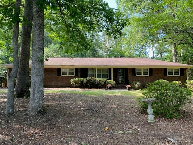 May be the best buy in the area/subdivision, few, if any like it. Four sided, all brick ranch w/two car side entry garage. May be the largest floorplan of this style in the area/subdivision, 2008 sq. ft. including garage. May also be the largest lot in the area/subdivision, with backyard consisting of two fenced double lots. Either of which could accomodate a pool, tennis court, basketball court, or pickleball court. AND the house is move-in ready. Some renovations, updates, upgrades made. Three nice size BR's. Two BA's, with primary bath updates. Large FMRM, large separate LVRM, separate diningroom area, and breakfast area. Very much sought after separate laundryroom and mudroom. Interior - Freshly painted throughout. Hardwood floors throughout. New separate wall oven, refrigerator, ceiling fans, window blinds, toilets, primary vanity, light plates/switches, painted garage floor. Exterior - Entire house pressure washed, gutter covers all around, fixtures painted, deck and garage door painted. BONUS - There is an additional 3 room building in the second rear lot that can be renovated into a variety of useful purposes. As an ADU it could be a money making AirBnB unit or apartment for tenants, parents/inlaws/kids, or even that recent graduate whose back home. Or maybe a workshop, salon, art studio, or of course the proverbial man cave or she-shed. Let your buyer see and decide. Don't miss this opportunity to purchase a very livable and desirable home. Nothing like it in this area/subdivision.
