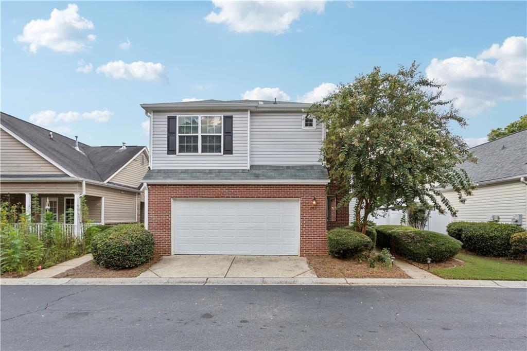 This charming home has been beautifully updated, and offers comfort, convenience, and style throughout. As you step inside, you’ll notice the living room that boasts soaring two-story ceilings, an abundance of natural light, a cozy gas fireplace, and built-in bookshelves, creating a warm and inviting space. The open floor plan flows from the living room into the kitchen, which is fully equipped with brand-new stainless-steel appliances, granite countertops, white cabinetry, a breakfast bar, and a pantry—perfect for everyday living and entertaining.
Upstairs, the spacious primary bedroom includes his-and-hers closets and an en-suite bath with ample vanity space, a soaking tub, and a recently updated, spacious shower. The two additional bedrooms share a full bathroom that is conveniently located in between them.
Enjoy the outdoors in the fully fenced, private backyard, which features a beautiful pergola covered patio. Additional features of this home include a two-car garage, a covered front entry that offers both keyed and keyless access for ease and security, a laundry equipped with a washer and dryer, a freshly painted interior and exterior, brand-new flooring throughout, double-paned windows, attic storage with disappearing stairs, an installed security system, and a front yard that is HOA-maintained for your convenience. Pet friendly—restrictions apply.
The highly sought after River Park community offers a swimming pool, clubhouse, playground, tennis courts, picnic area, and a seating area with a fire pit. It has easy access to I-575, and is located conveniently to downtown Woodstock, the Woodstock Outlet Mall, Costco, Kroger, Olde Rope Mill Park, JJ Biello Park, and tons of additional shopping, restaurants, and entertainment.