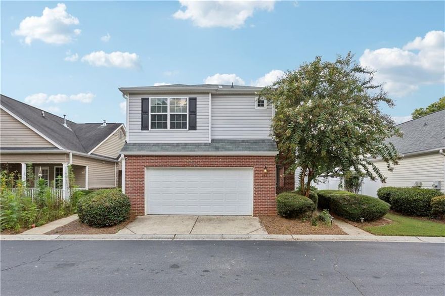 This charming home has been beautifully updated, and offers comfort, convenience, and style throughout. As you step inside, you’ll notice the living room that boasts soaring two-story ceilings, an abundance of natural light, a cozy gas fireplace, and built-in bookshelves, creating a warm and inviting space. The open floor plan flows from the living room into the kitchen, which is fully equipped with brand-new stainless-steel appliances, granite countertops, white cabinetry, a breakfast bar, and a pantry—perfect for everyday living and entertaining.

Upstairs, the spacious primary bedroom includes his-and-hers closets and an en-suite bath with ample vanity space, a soaking tub, and a recently updated, spacious shower. The two additional bedrooms share a full bathroom that is conveniently located in between them.

Enjoy the outdoors in the fully fenced, private backyard, which features a beautiful pergola covered patio. Additional features of this home include a two-car garage, a covered front entry that offers both keyed and keyless access for ease and security, a laundry equipped with a washer and dryer, a freshly painted interior and exterior, brand-new flooring throughout, double-paned windows, attic storage with disappearing stairs, an installed security system, and a front yard that is HOA-maintained for your convenience. Pet friendly—restrictions apply. 

The highly sought after River Park community offers a swimming pool, clubhouse, playground, tennis courts, picnic area, and a seating area with a fire pit. It has easy access to I-575, and is located conveniently to downtown Woodstock, the Woodstock Outlet Mall, Costco, Kroger, Olde Rope Mill Park, JJ Biello Park, and tons of additional shopping, restaurants, and entertainment.