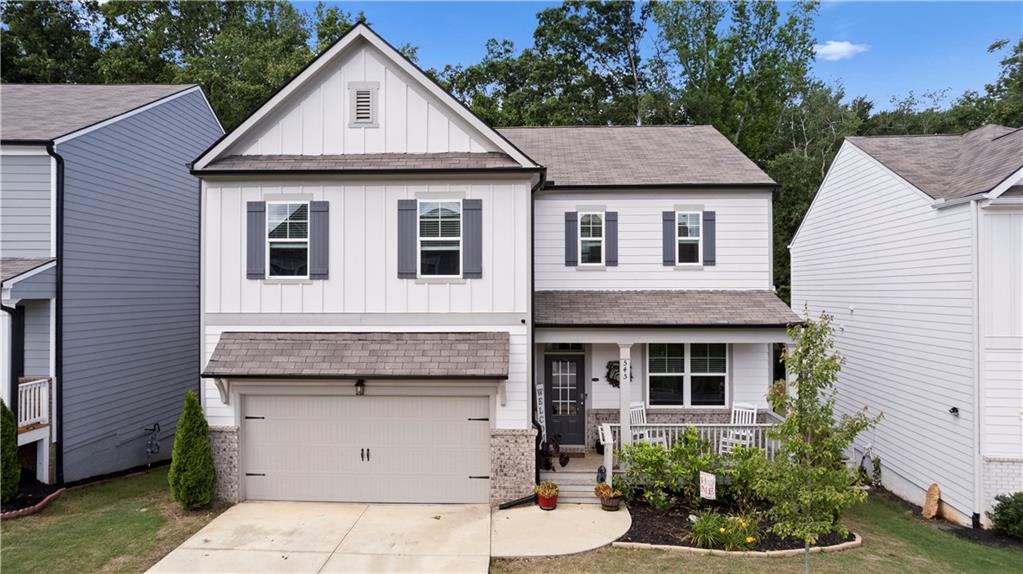 Welcome to 545 Quail Pass — where a 3121 sq ft modern design meets timeless charm in the heart of Dawsonville. This nearly-new, impeccably staged home feels like something straight out of a magazine, offering elevated living across every level — and an unforgettable finished basement that will steal the show.
From the moment you step inside, you’ll be greeted with warm, open spaces and a thoughtful layout designed for real life. With plenty of bedrooms for everyone (plus guests!), this home effortlessly blends space and style. The main living area flows into a light-filled kitchen with sleek cabinetry, a large island, and upgraded finishes that make entertaining or everyday meals feel special.
Downstairs, discover a timeless and moody basement retreat that feels like a destination in itself. Slate accents and fixtures tie the entire space together, creating a cozy yet sophisticated vibe that’s perfect for hosting game nights, movie marathons, or casual evenings with friends. The stunning live-edge cedar bar top adds a touch of rustic luxury to the oversized kitchenette, giving you everything you need to serve up drinks, snacks, or even full meals without missing a moment of the fun.
This level also opens to a spacious, private patio — perfect for fall fire pits, morning coffee, or late-night laughs under the stars.
And don’t miss the show-stopping bathroom: wrapped in slate tile with a luxurious rain shower, this spa-inspired space makes every day feel like a five-star getaway. Even the stairwell makes a statement with beautifully tiled walls that elevate the entire look and feel of the home.
Every inch of this property has been curated with care — from smart upgrades to the artful staging — so you can move right in and enjoy. Whether you’re gathering upstairs, hosting downstairs, or just soaking in the peaceful setting, 545 Quail Pass is more than a house… it’s home.
Located in Dawsonville, you’re close to North Georgia’s best hiking, shopping, dining, and lake life — with easy access to GA 400 and top-rated schools nearby.