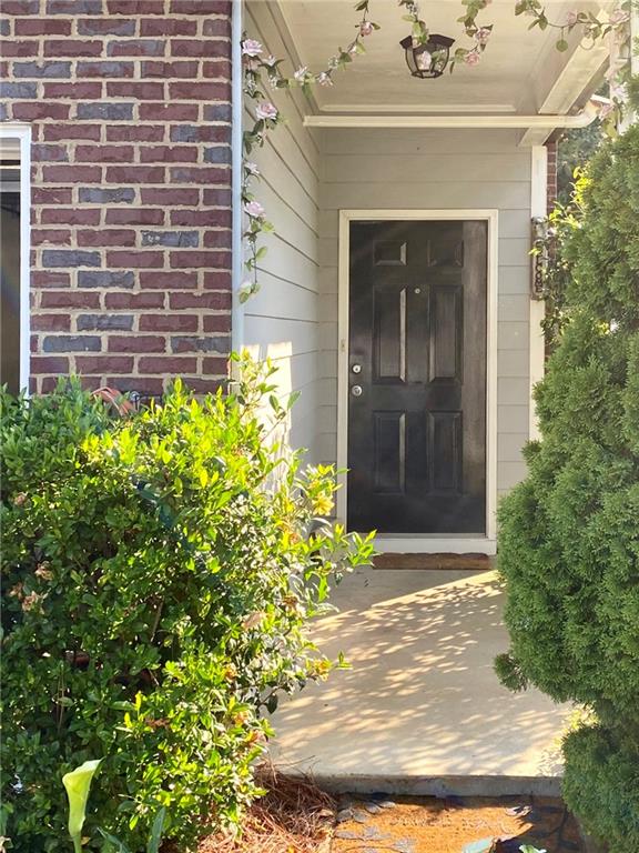 2-story townhome in the heart of Norcross. with an open floor plan that is perfect for both relaxation and entertaining. The living room is bathed in natural light, creating a warm and welcoming environment for family gatherings or cozy nights in. The true centerpiece of the home is the kitchen, featuring a large island, custom cabinets, and luxurious granite countertops. This kitchen is both beautiful and practical. the perfect spot for casual meals or a cup of coffee while overlooking the private, fully-fenced backyard. Upstairs, a great-sized walk-in closet to keep everything organized. The bathroom is equally spacious, featuring double vanities, a separate tub, and a walk-in shower. Two additional well-sized bedrooms provide plenty of room for guests, home office space, or creative use of the additional rooms. The second full bathroom features modern finishes and is conveniently located to serve the two bedrooms. with a two-car garage, complete with built-in storage, ensuring you have all the space you need for your vehicles and belongings. The private, fenced backyard is perfect for enjoying the outdoors, whether you're relaxing, grilling, or entertaining friends. Located just minutes from I-85, Lawrenceville Highway, and Singleton Road, commuting and running errands is a breeze. You’ll have easy access to Walmart, shopping centers, and a variety of restaurants – everything you need just around the corner. Don't miss the chance to make this exceptional townhome your next home. With its fantastic upgrades, modern finishes, and convenient location, this property is sure to go quickly. Schedule your tour today and experience firsthand why this could be your