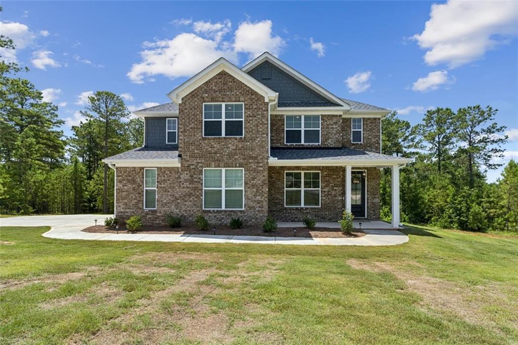 Gorgeous home in excellent condition! Seller is relocating and hates to give up this home. The home features 4 bedrooms and 3.5 baths with owner's suite on the main level. Kitchen is completely updated and opens to family room. Sit on your deck and enjoy your morning coffee overlooking 2 acres. A must see!