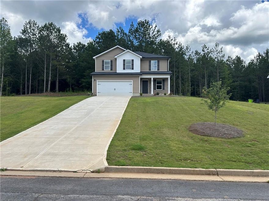 READY NOW! NO HOA! Welcome to the charming Kyndle plan! Situated on a spacious 0.67-acre lot, this beautiful 4-bedroom, 2.5-bathroom home in the heart of Covington offers an ideal blend of style and comfort. The open floor plan is perfect for entertaining and everyday living, featuring a sunlit living room, formal dining area, and a modern kitchen with ample cabinet space, stainless steel appliances, and a breakfast bar. Upstairs, the spacious master suite boasts a walk-in closet and an en-suite bath with double vanities and a walk-in shower. Enjoy the private backyard for relaxing or gathering with loved ones. Conveniently close to schools, shopping, dining, and parks, this home has it all! Why rent when you can own this beautiful, brand new construction home now. Incentives are available to utilize towards closing costs and/or rate buy down with the use of our preferred lender. Hurry this one won't last!